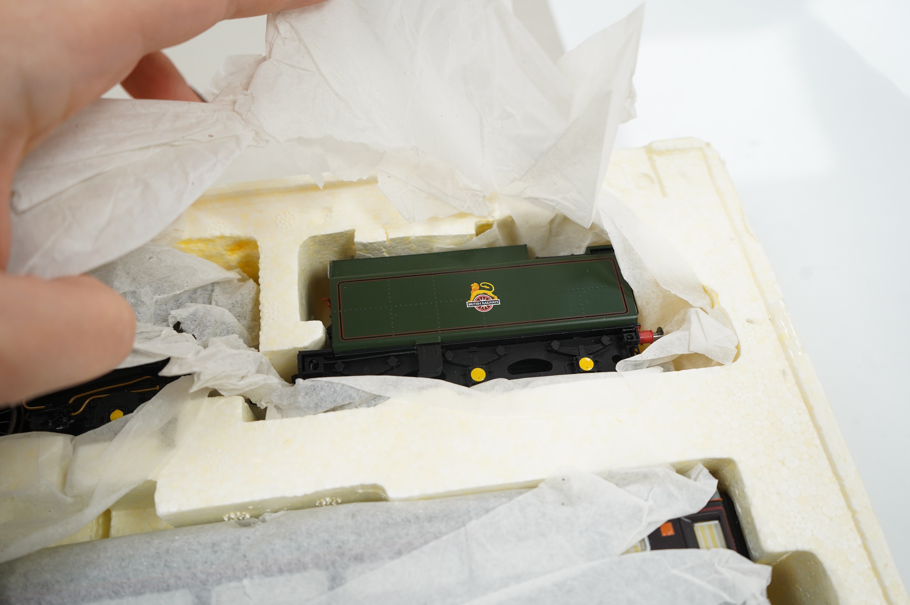 A Hornby Hobbies 00 gauge railway ‘Diamond Jubilee’ train pack, R3094, Queen Elizabeth II Royal Train comprising of a BR Britannia class locomotive and three carriages. Condition - good.